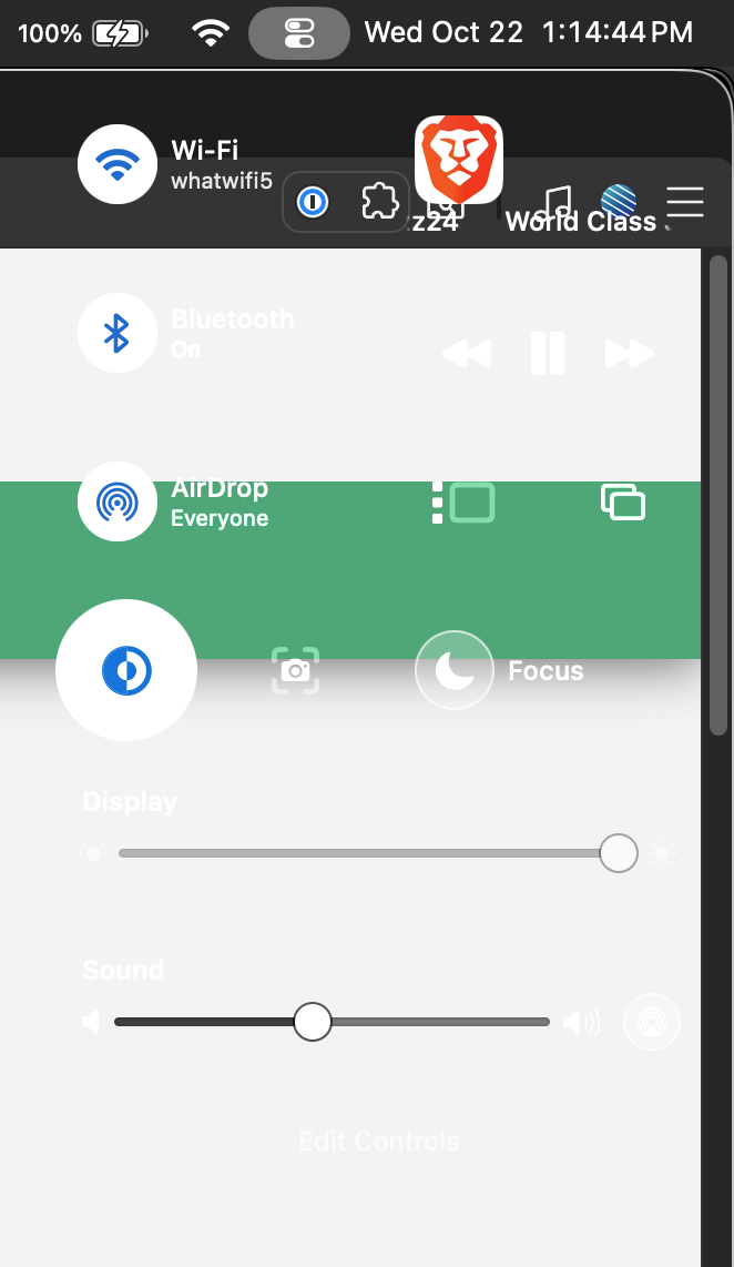 The control center in front of a web page with a light background.